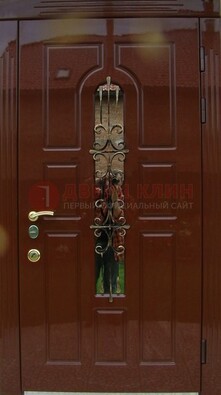 Красивая металлическая дверь со стеклом и ковкой ДСК-33 в Щербинке