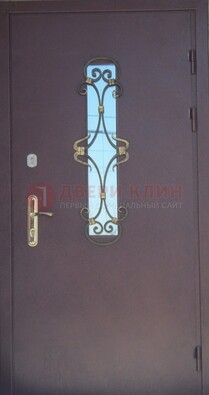 Металлическая дверь со стеклом и ковкой ДСК-77 в Щербинке